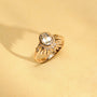 Bague Solana dorée en plaqué or 18 carats ornée d’une améthyste verte et de détails soleil texturés