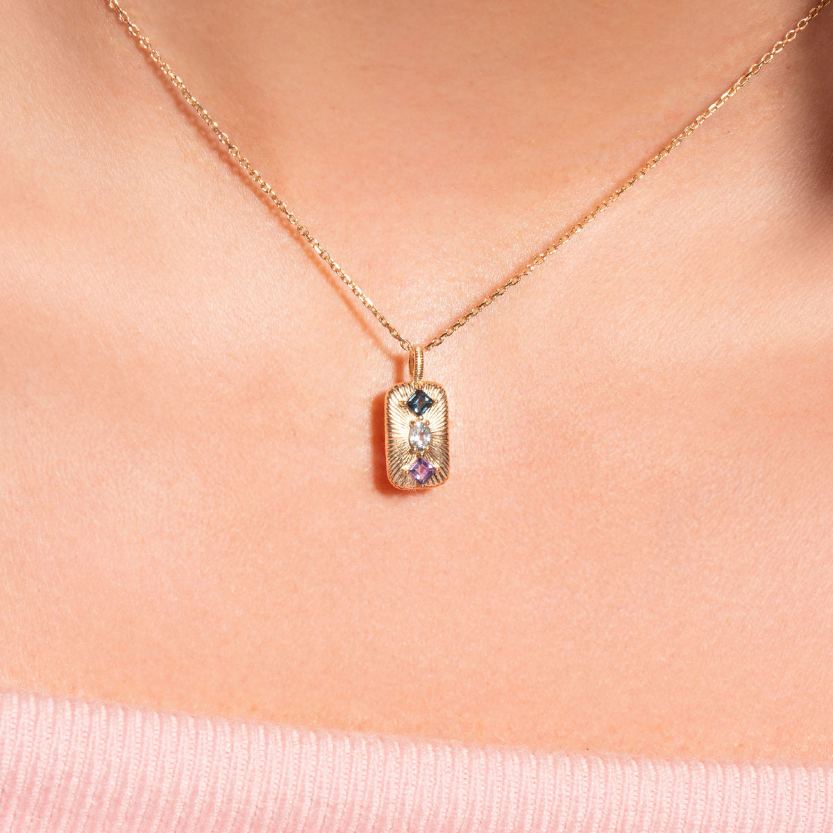 Collier Aurora dorée en plaqué or 18 carats ornée de topazes bleue et London Blue et d’une améthyste violette